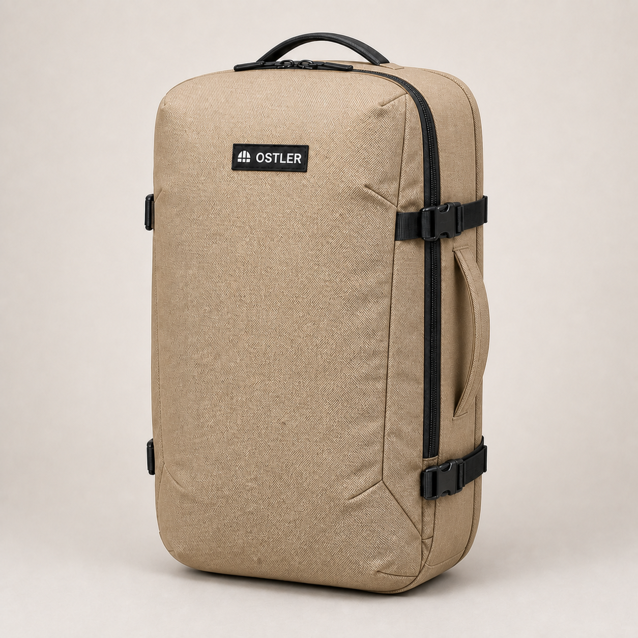 Transit Travel Pack 25L in Sand, three-quarter view